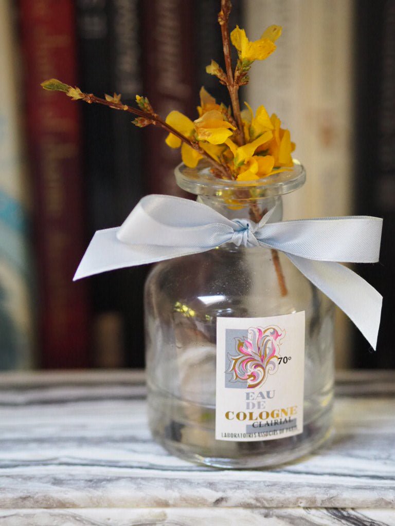 Antique cologne labels on apothecary bottles for styling - Natalia Willmott