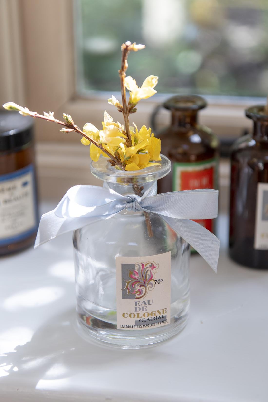 Antique cologne labels on apothecary bottles for styling - Natalia Willmott