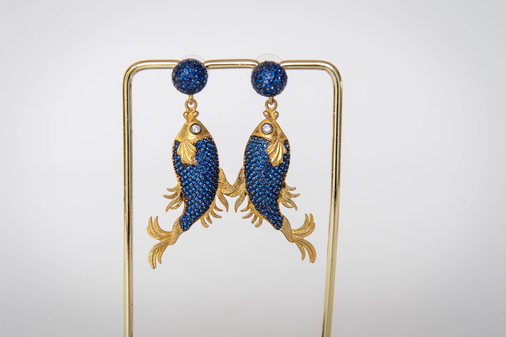 blue fish gold plated earrings - Natalia Willmott