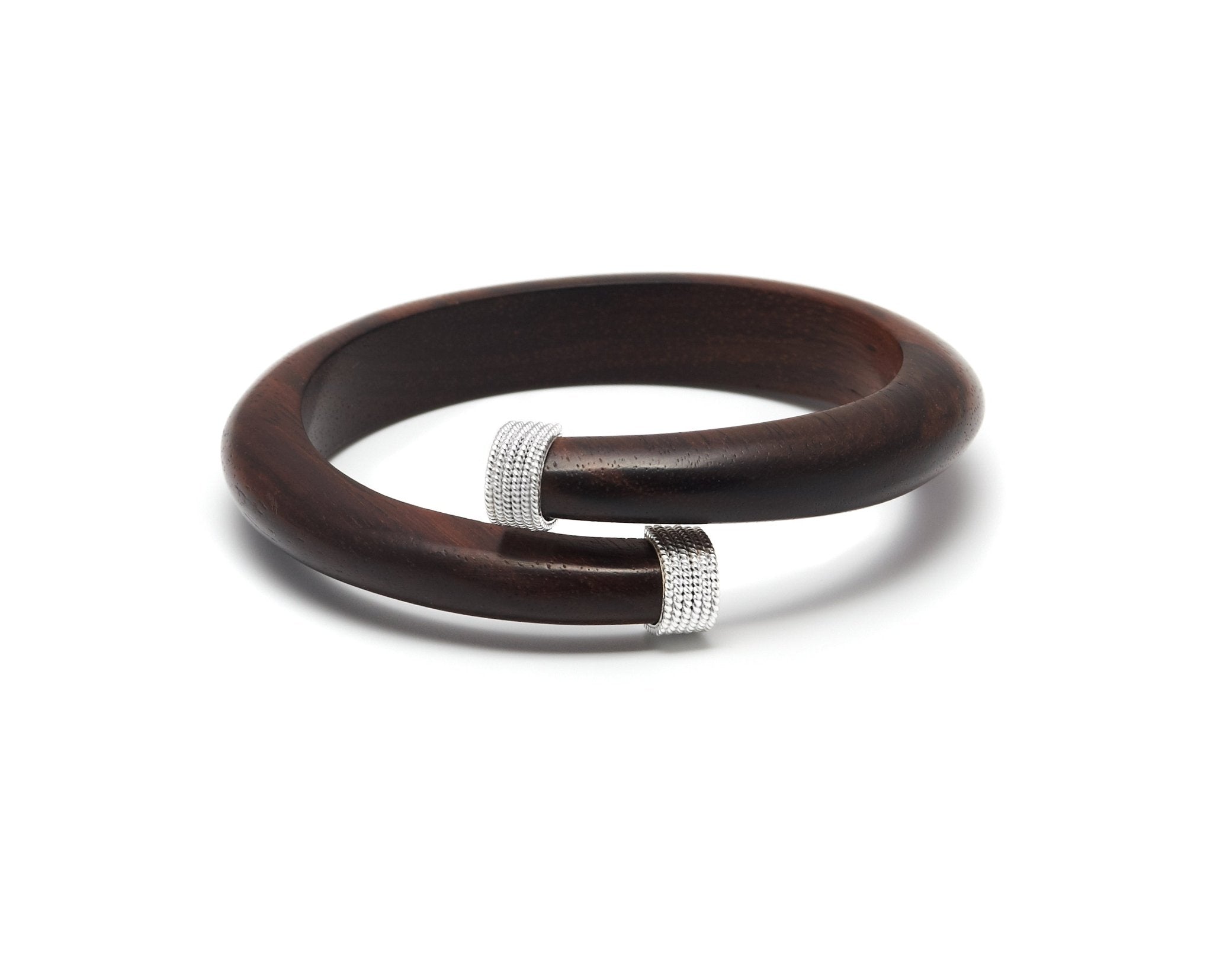 Dark wood spiral bangle with silver caps - Natalia Willmott