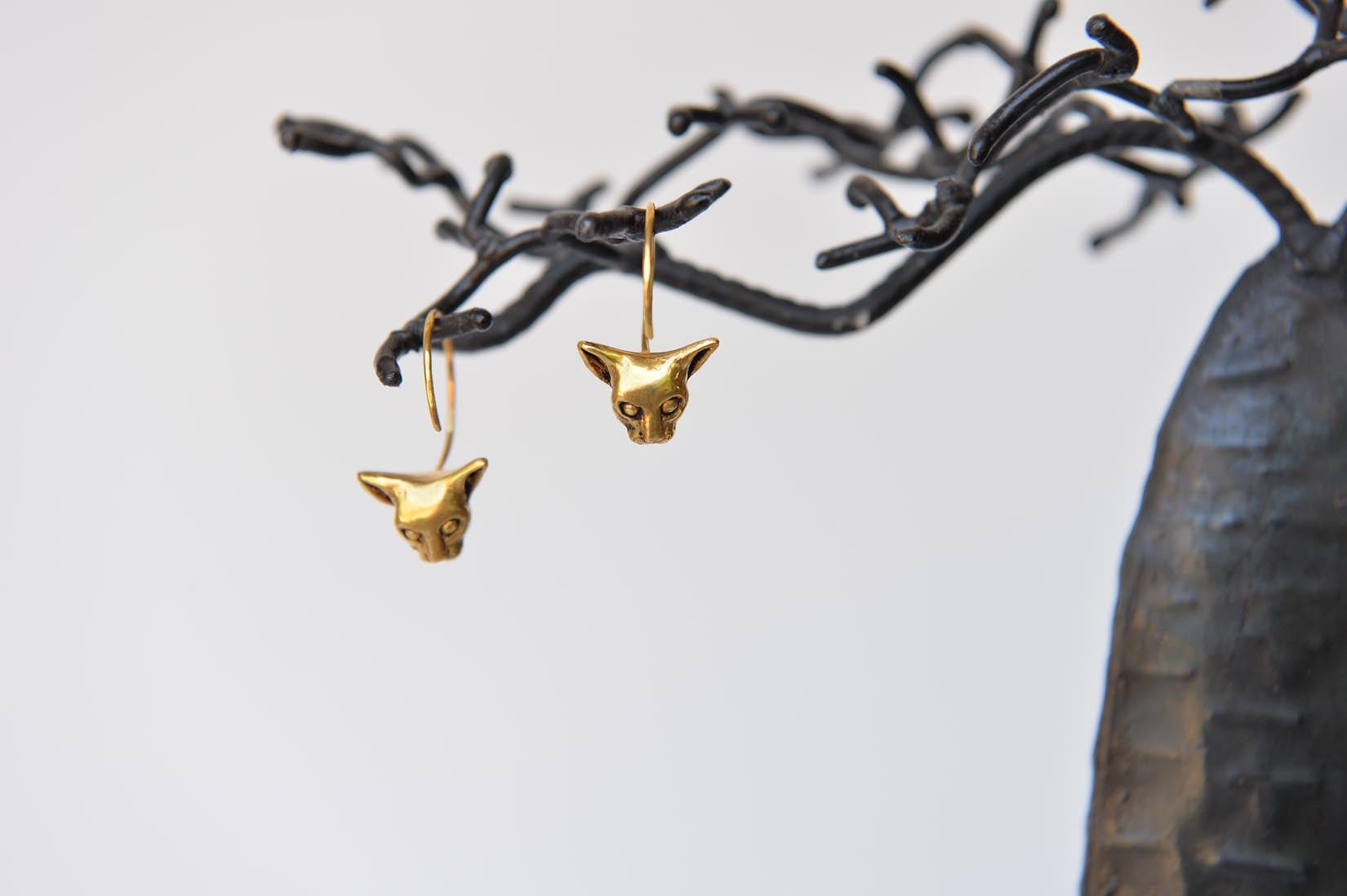 Gold/silver cat earrings by Elisabeth Riveiro - Natalia Willmott