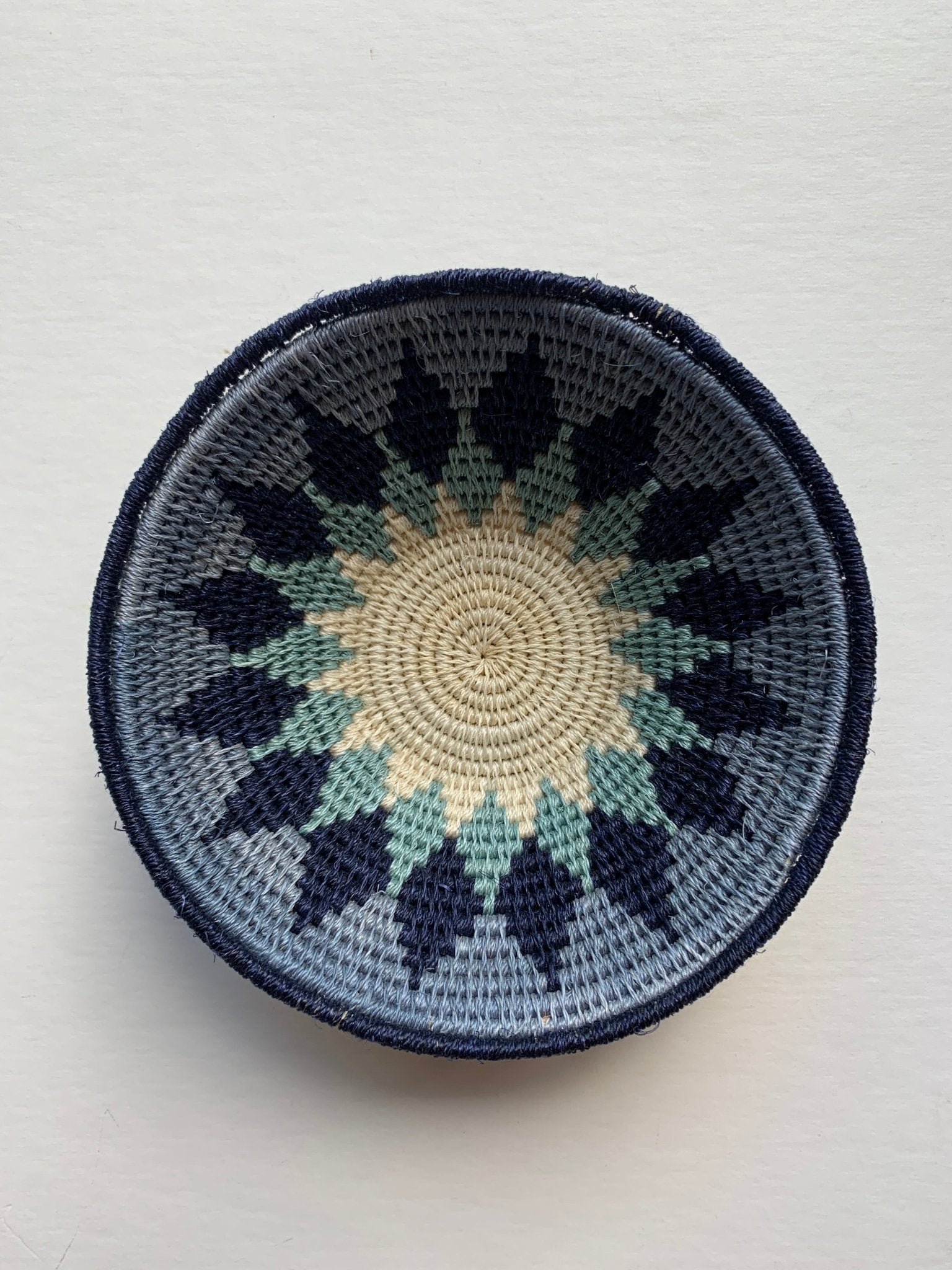 Hand woven sisal basket plate - sunburst blue - Natalia Willmott