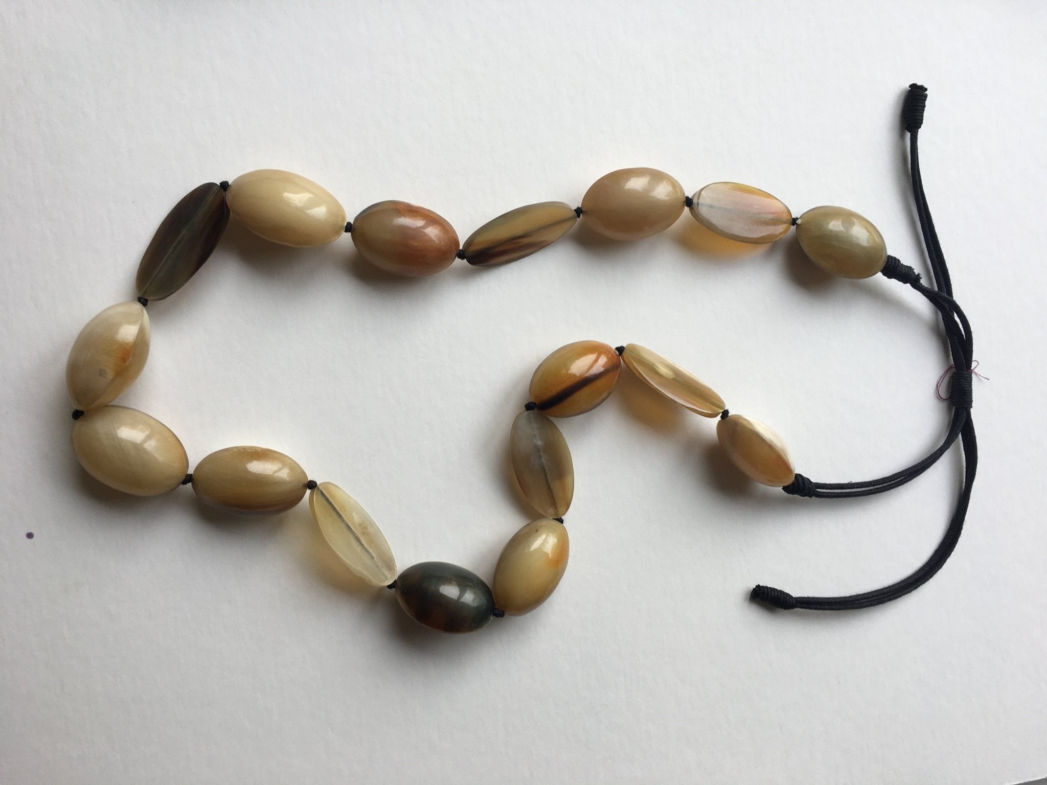 Horn necklace with waxed cord - Natalia Willmott