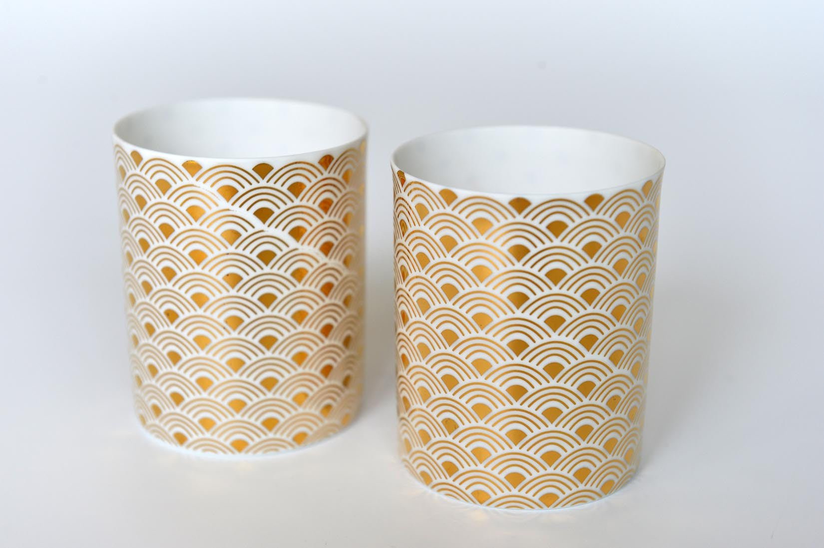 Porcelain votive with a gold rainbow design - Natalia Willmott