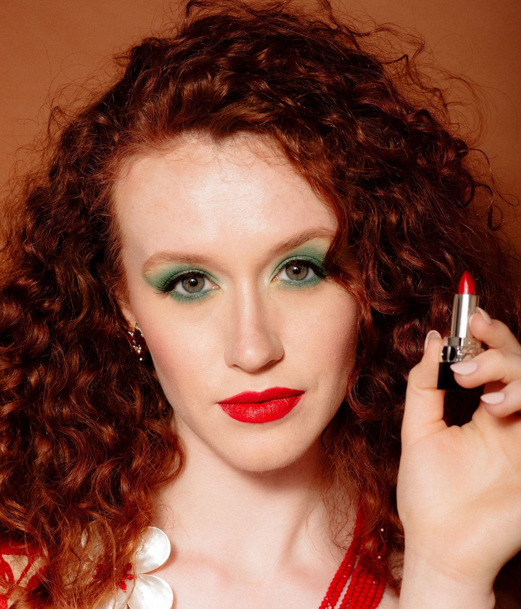 Red beaded multistrand necklace with mother-of-pearl flower - Natalia Willmott