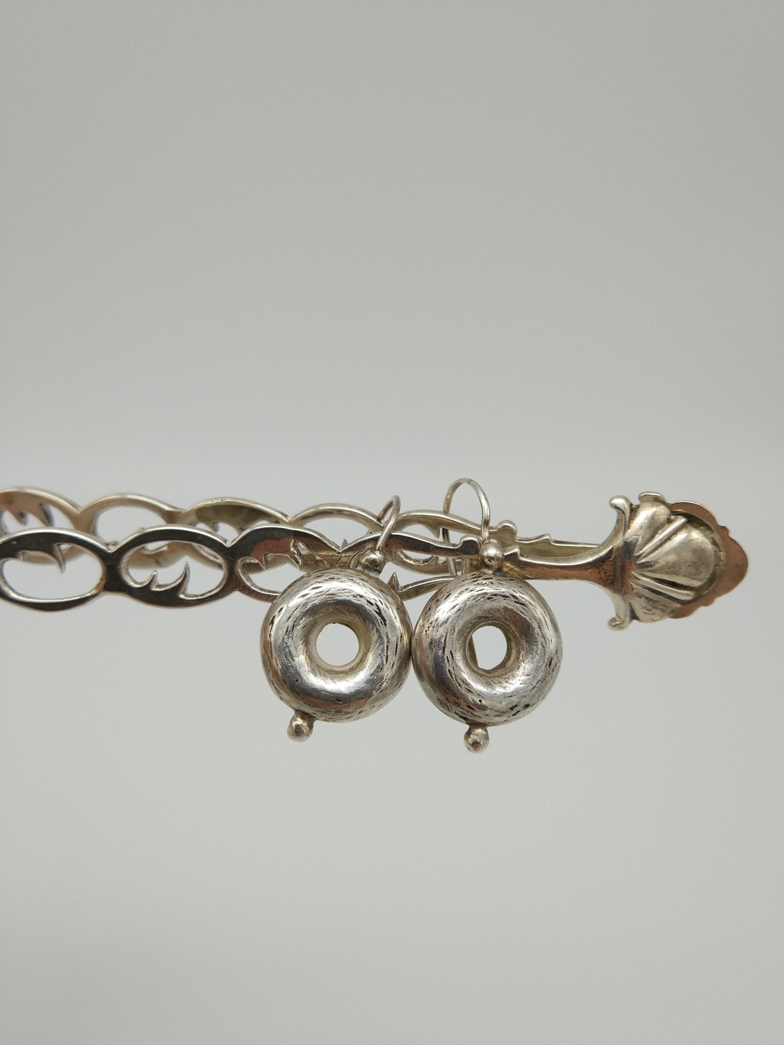 Silver Donut earrings by Elisabeth Riveiro - Natalia Willmott