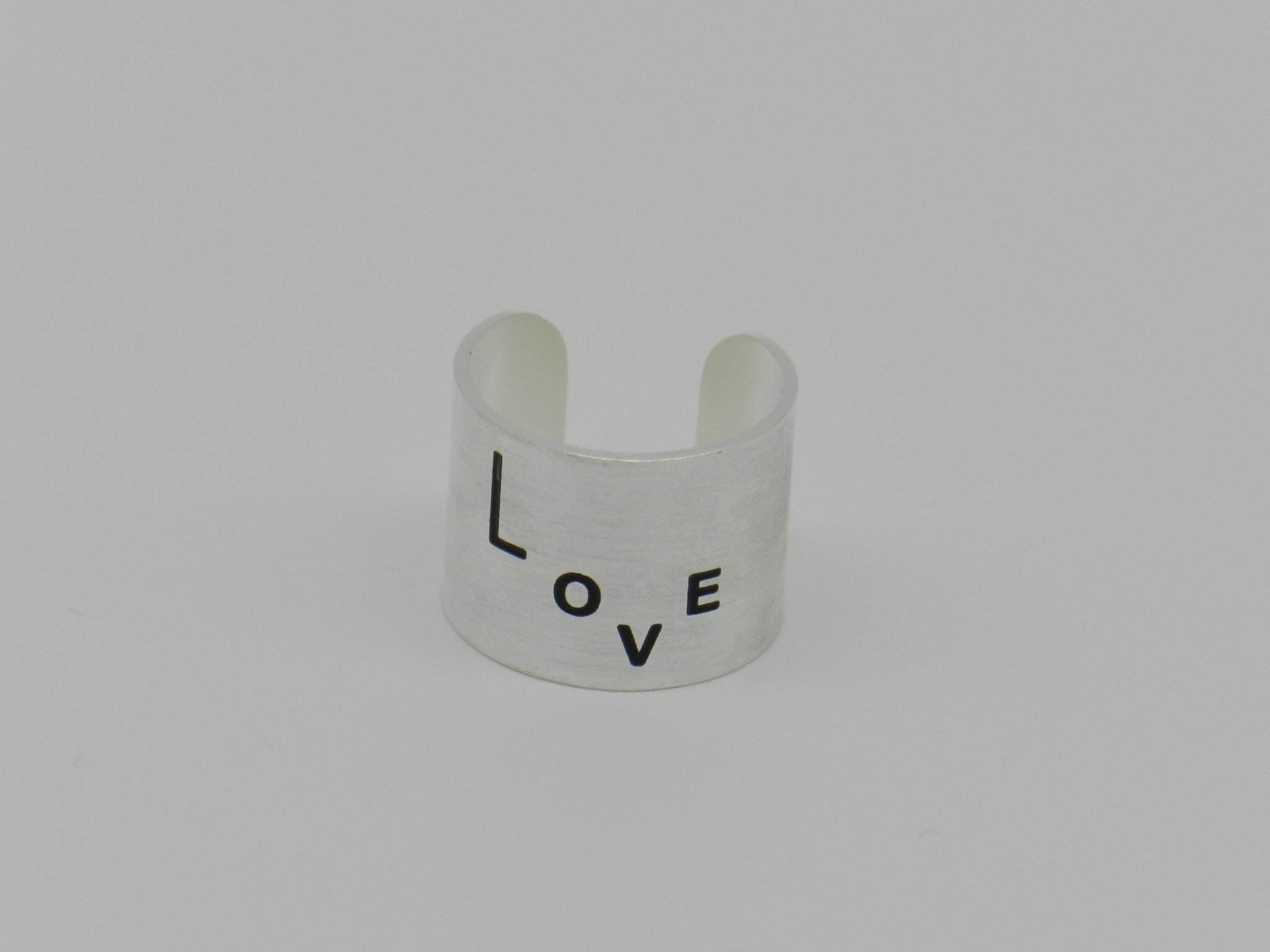 Wide LOVE ring in silver or gold - Natalia Willmott