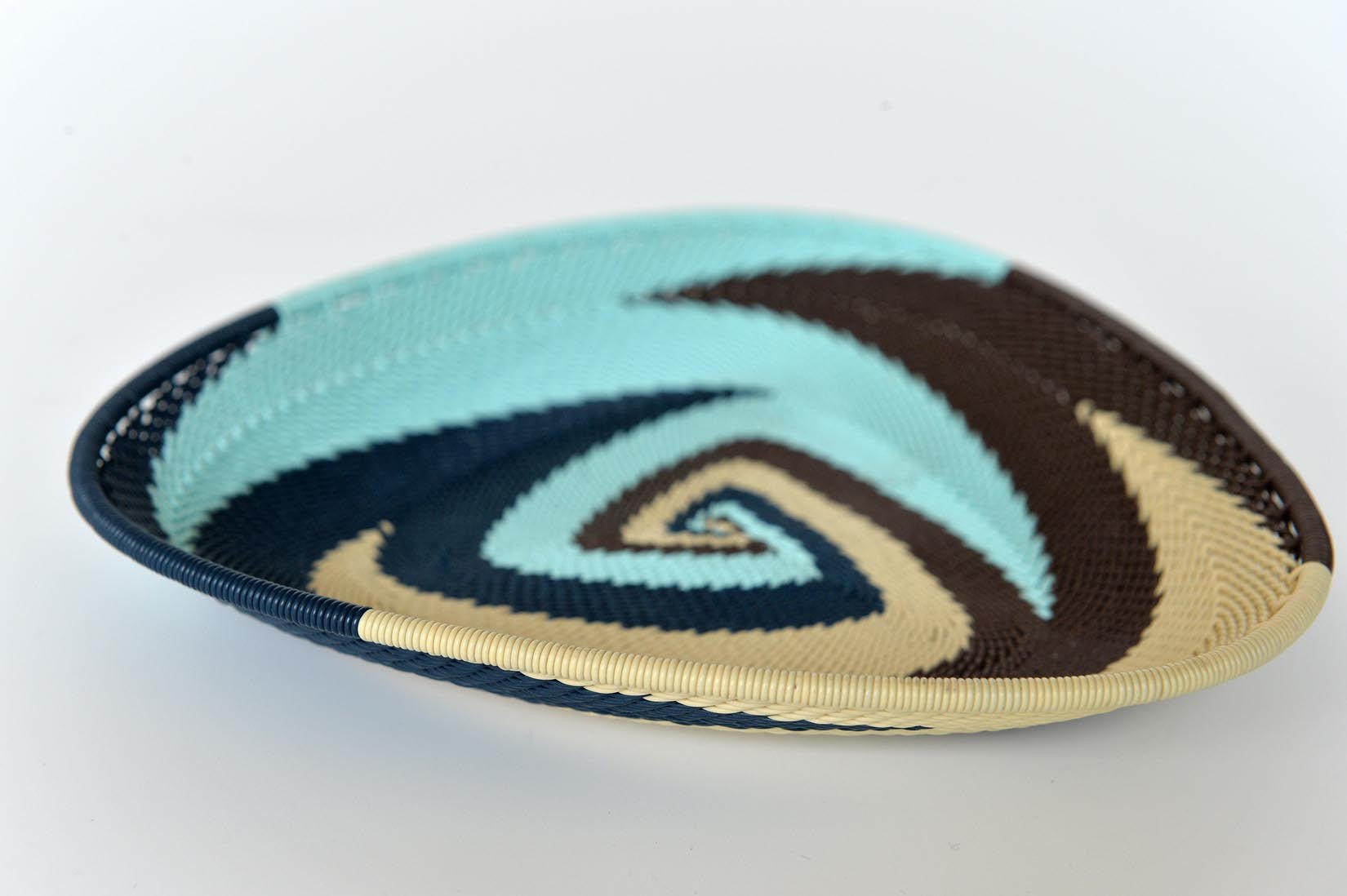 Zulu triangular basket plate - blues and browns - Natalia Willmott