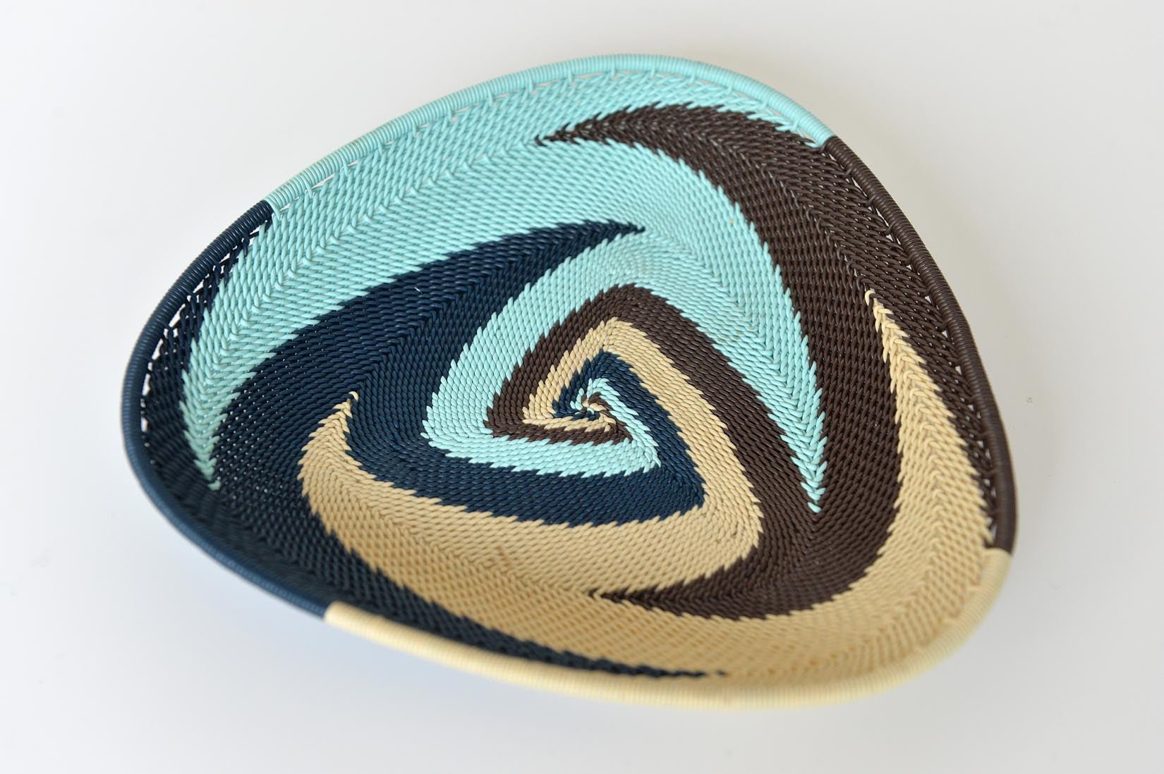 Zulu triangular basket plate - blues and browns - Natalia Willmott