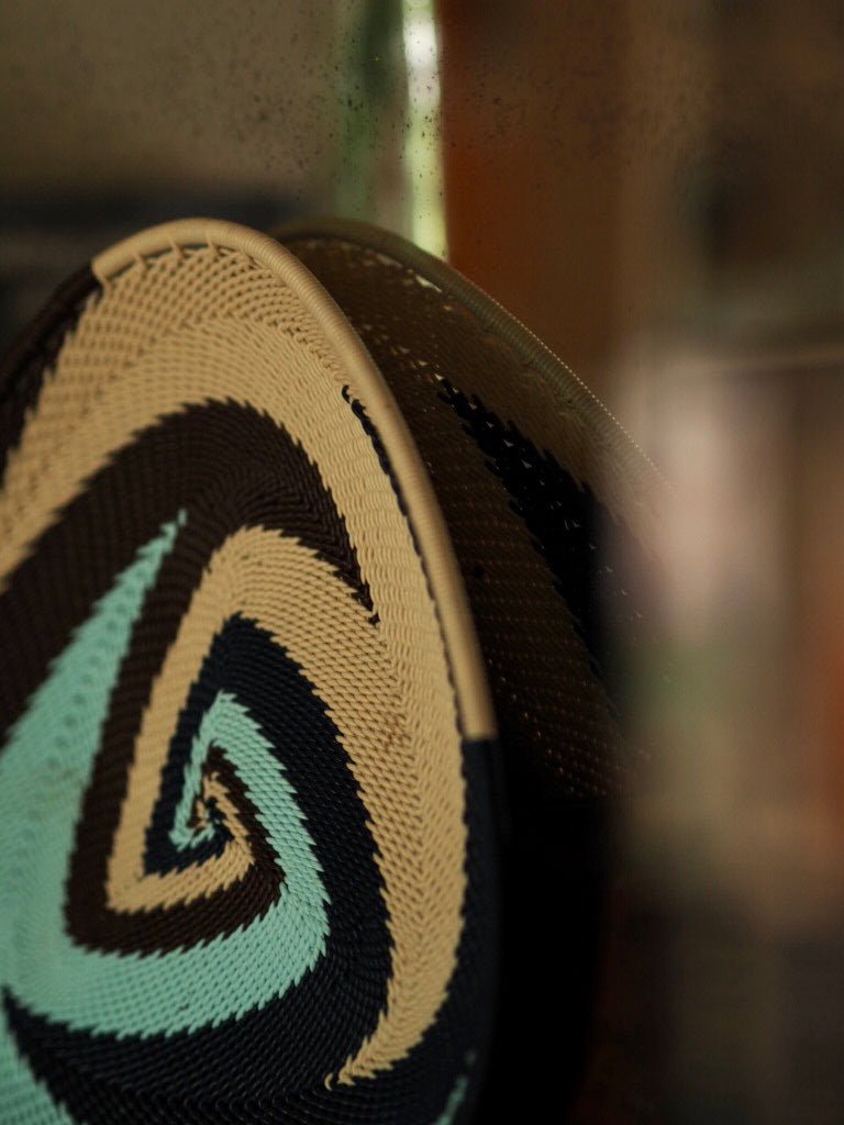 Zulu triangular basket plate - blues and browns - Natalia Willmott