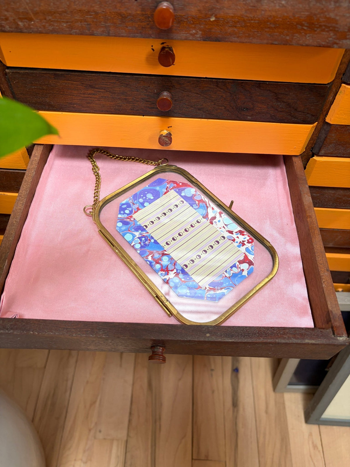 Brass frame with original Art Deco textile shirting design" - Natalia Willmott