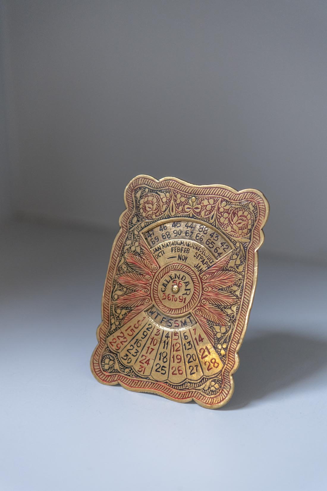 brass vintage Indian perpetual calendar - Natalia Willmott