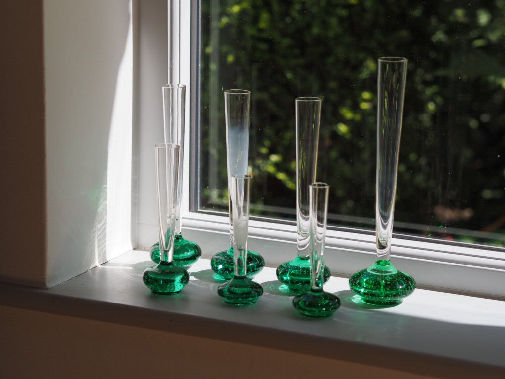 Set of 7 mid century green bud glass vases - Natalia Willmott