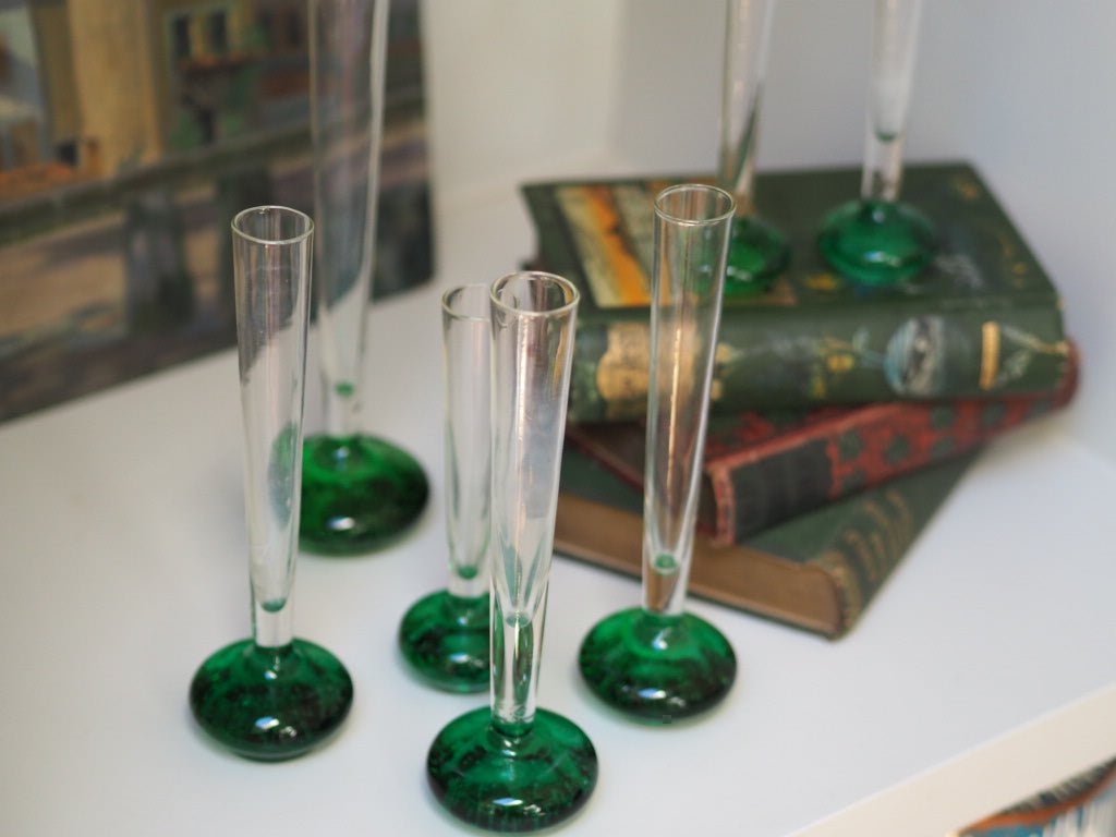 Set of 7 mid century green bud glass vases - Natalia Willmott
