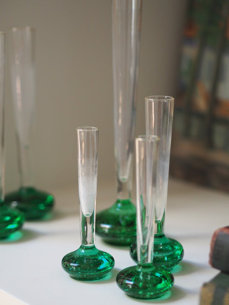 Set of 7 mid century green bud glass vases - Natalia Willmott