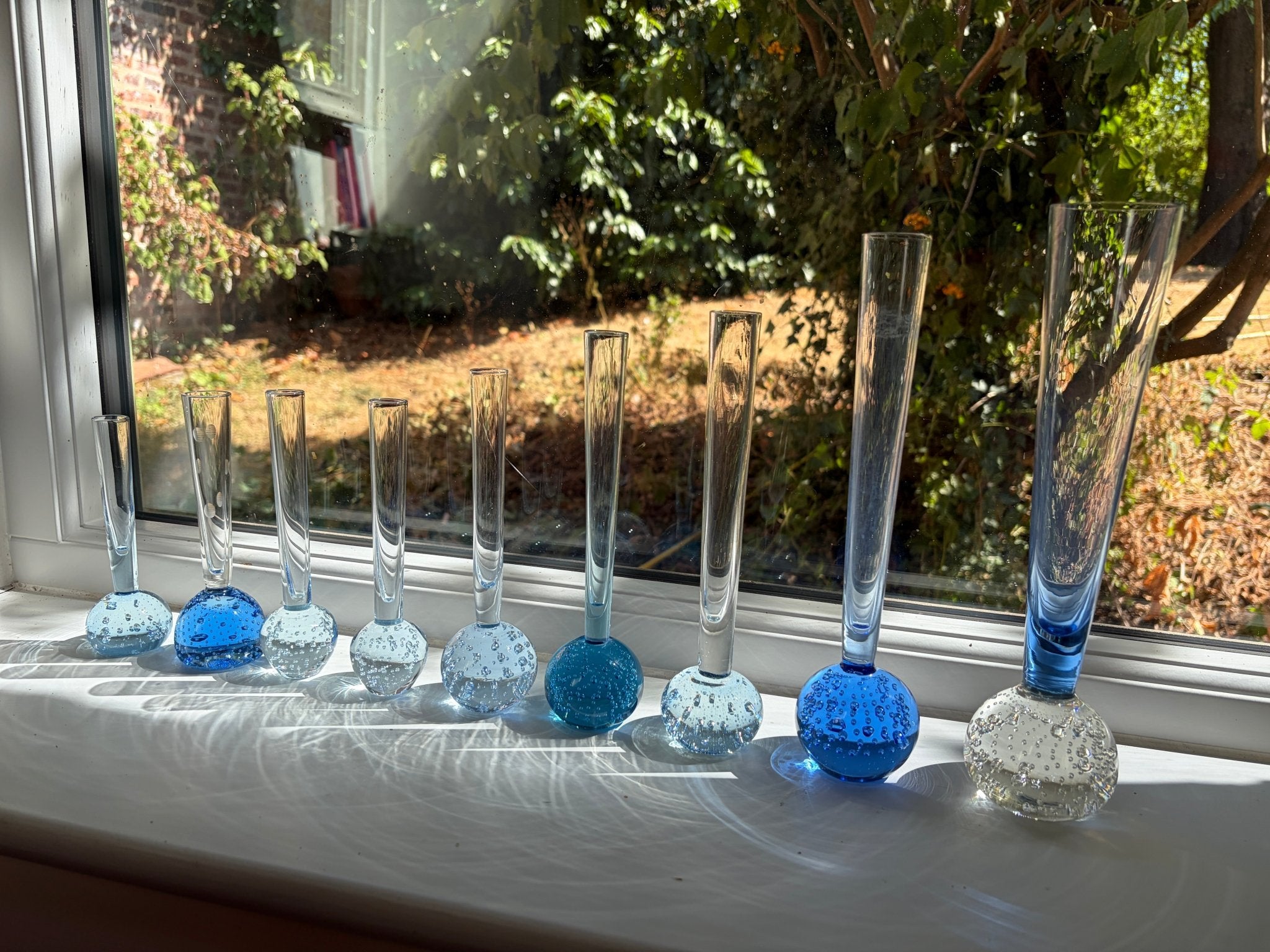 Set of 9 mid century bud glass vases - Natalia Willmott