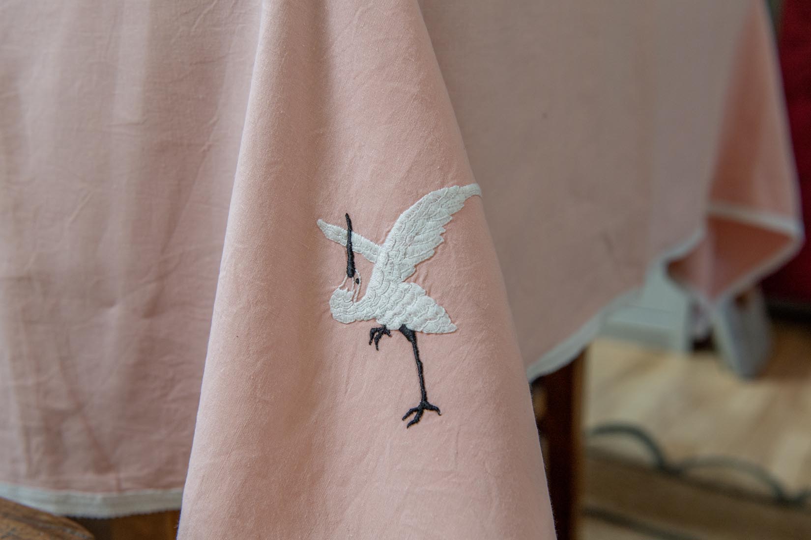 Vintage crane embroidered pink tablecloth and napkin set - Natalia Willmott
