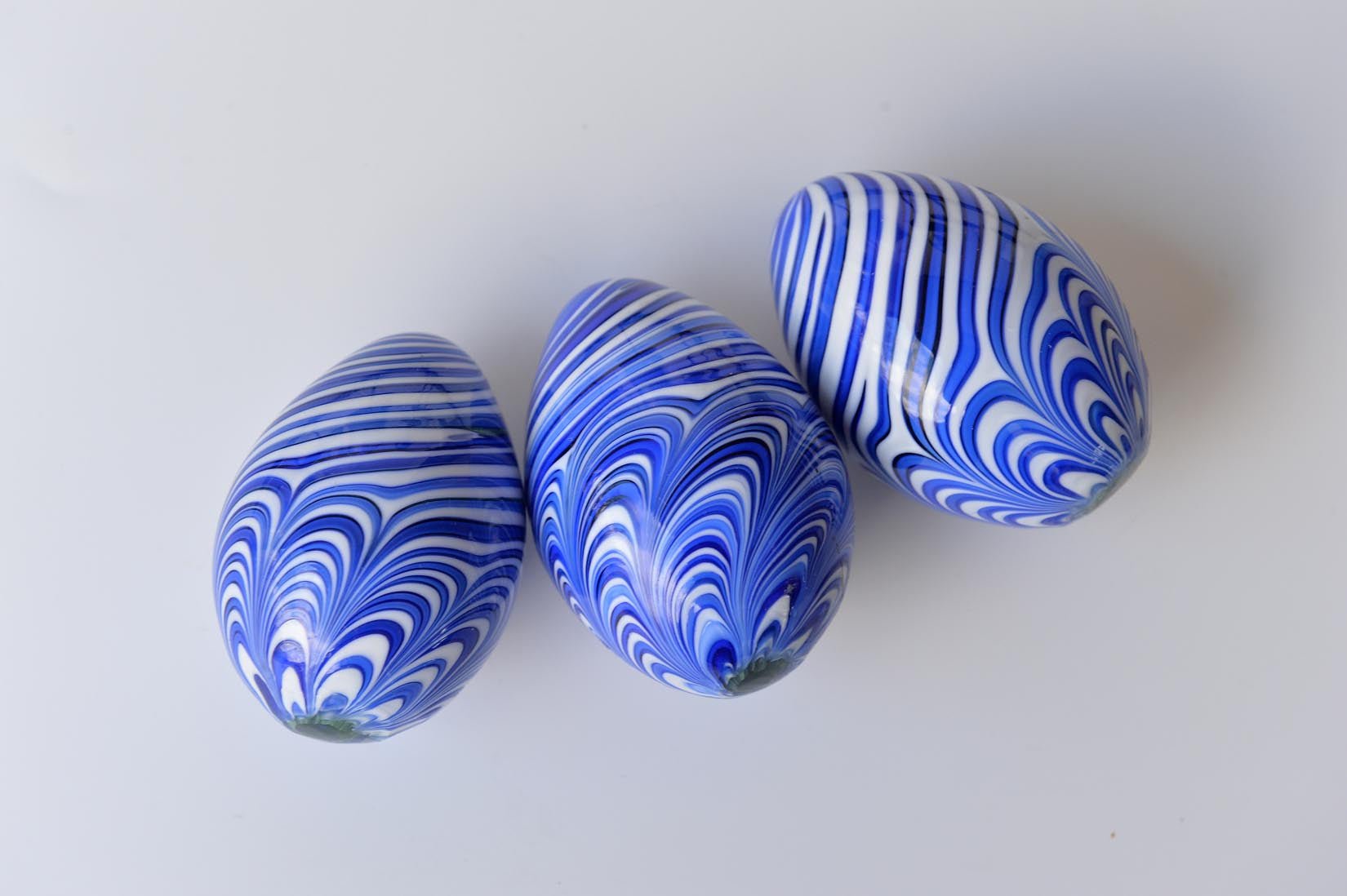 Blue and white glass eggs - Natalia Willmott