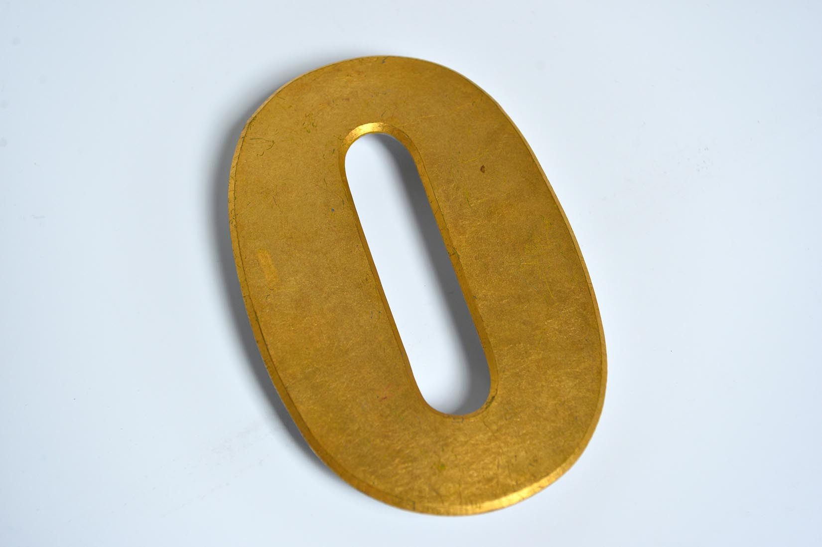 Large gold distressed letter