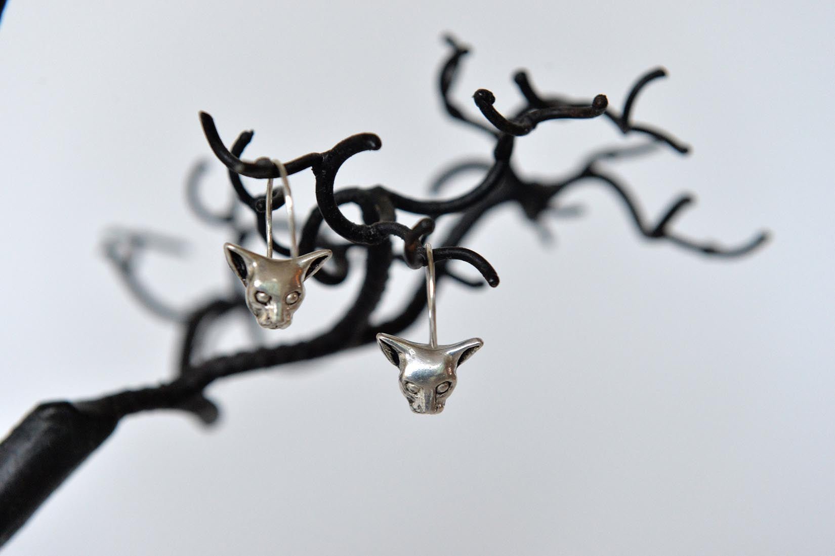 Gold/silver cat earrings by Elisabeth Riveiro - Natalia Willmott