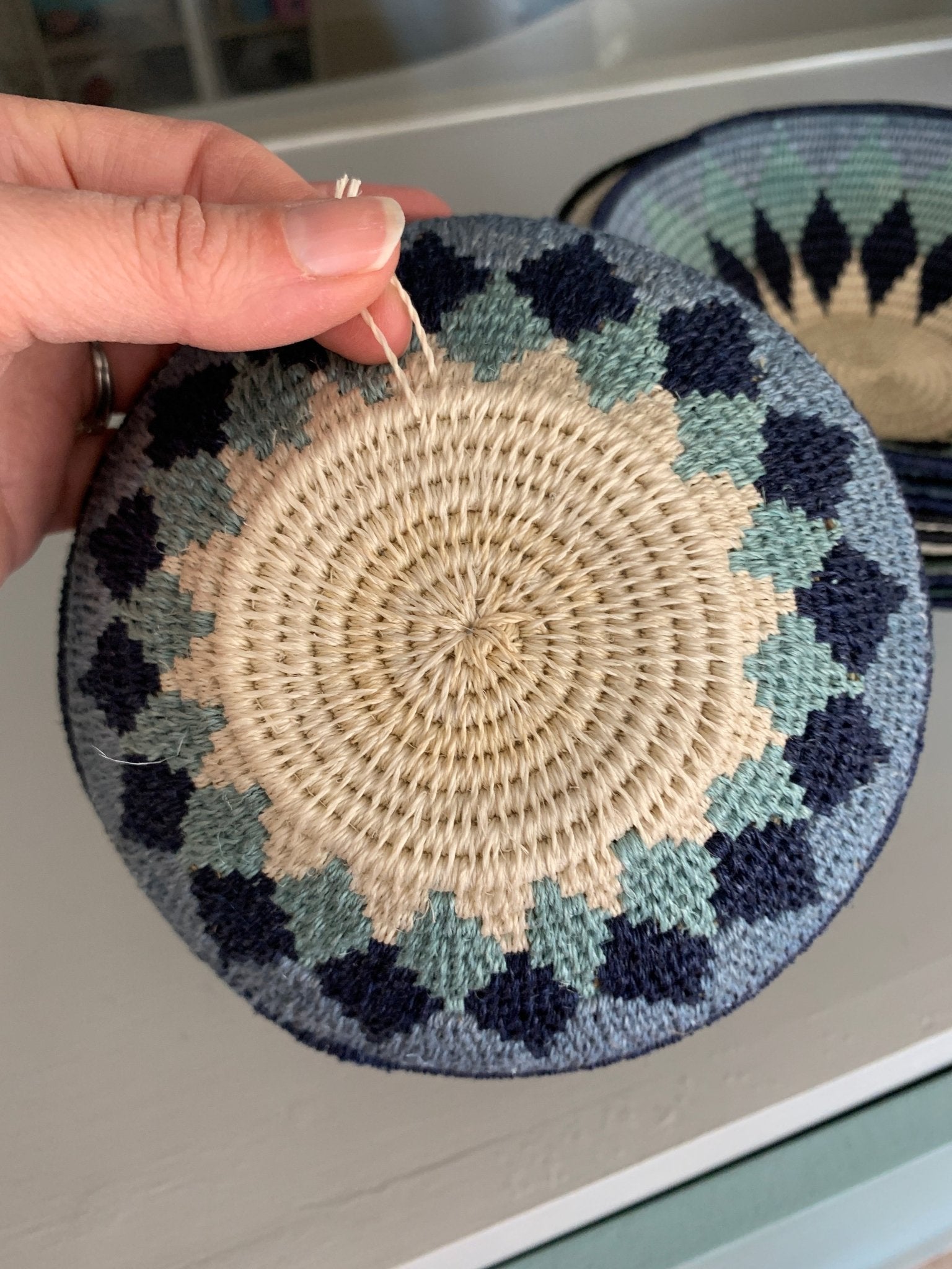 Hand woven sisal basket plate - sunburst blue - Natalia Willmott