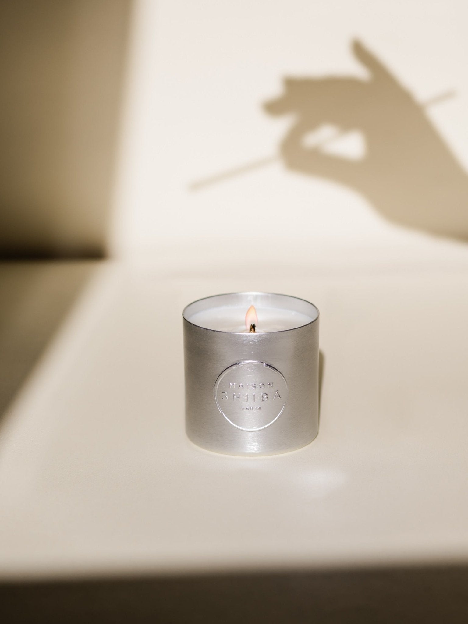 Silver candle with secret message - Natalia Willmott